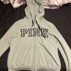 green “PINK” jacket worn twice with blue marker stain, should come out in a wash